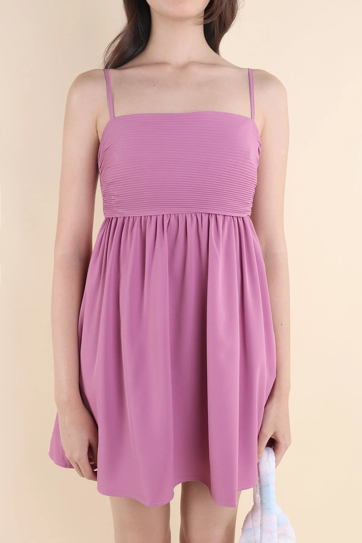 BEA PLEATED BABYDOLL DRESS IN MAGENTA