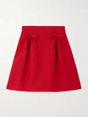 Bow-detailed pleated wool and silk-blend mini skirt